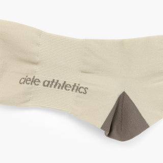 beige sock with brown accents and 'ciele athletics' branding on a white background