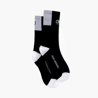 black socks with white accents on a white background