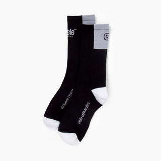 pair of black color socks with white accents on a white background
