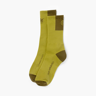 pair of green color socks with dark green accents on a white background