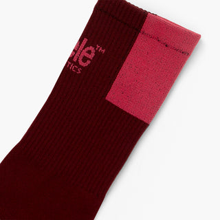 elastic of brick sock with red patch on a white background