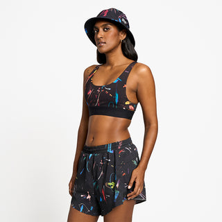 side view of ciele athletics QCKBra running bra from the summer nights limited edition, on a model