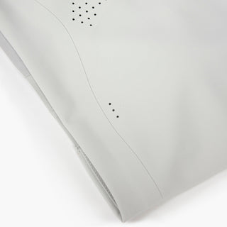 close view of the laser perforations on the ciele athletics SPDBra running bra in light grey