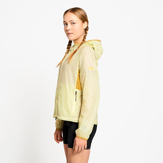 side view of ciele athletics VNTJacket lightweight running jacket for women in glade color on a model