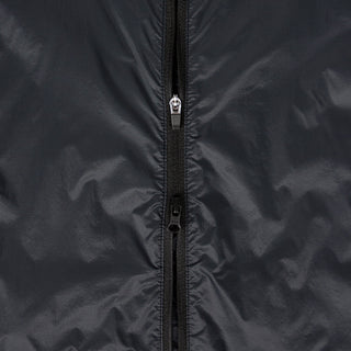 closeup view of the double sided zipper of the ciele athletics VNTJacket lightweight running jacket for women in shadowcast color