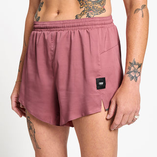 close front view of ciele athletics ATShort 4 inch with liner short in deco rose color on a model