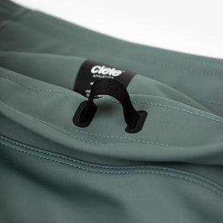 close view of the trimmable feature on the ciele athletics FSTTight short running short in silver pine