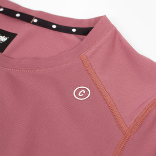 close view of c logo on the ciele athletics FSTTShirt lightweight and performance driven T-Shirt in deco rose