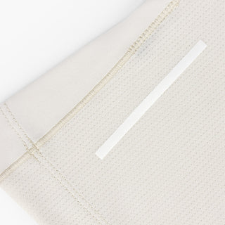 close view of the back reflective detail on the ciele athletics DLYTshirt lightweight and performance driven T-Shirt in rainy day