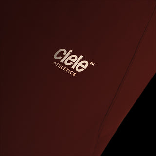 close view of the reflective logo on the ciele athletics DLYTshirt lightweight and performance driven T-Shirt in clay, when reflective