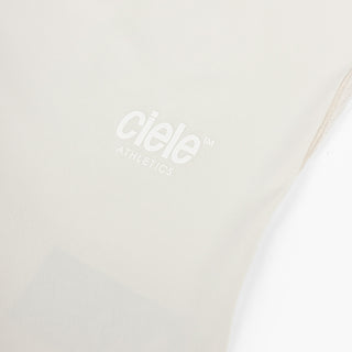 close view of the reflective logo on the ciele athletics DLYTshirt lightweight and performance driven T-Shirt in rainy day