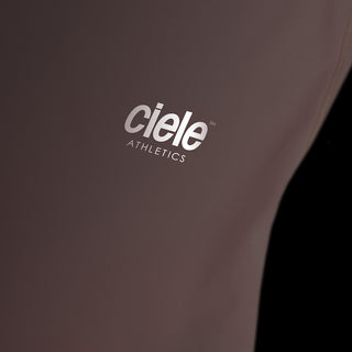 close view of the reflective logo on the ciele athletics DLYTshirt lightweight and performance driven T-Shirt in peachskin, when reflective