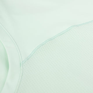 close view of the breathable fabrics on the ciele athletics DLYTSinglet lightweight and performance driven singlet in dusty turquoise